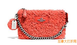 快！ COACH  Shearling Nolita Wristlet 羊羔绒真皮小手包5.6折特价81.56元，原价145元